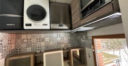 VENTE APPARTEMENT RDC – UNE CHAMBRE – JARDIN – GARAGE